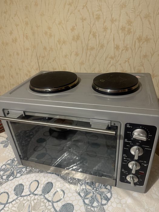 Продам печь с двумя электроплитами Elenberg