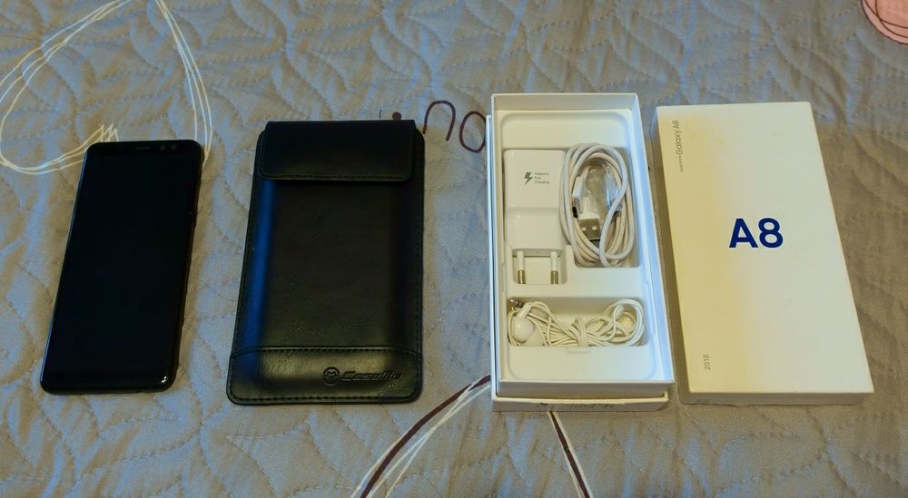 Продам смартфон Самсунг А8г Таб7+