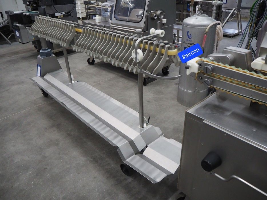 Handtmann Машина за връзване/пресукване  и окачване