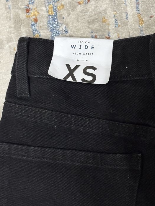 Новые черные джинсы