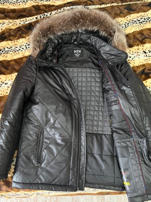 Продам новую мужскую куртку