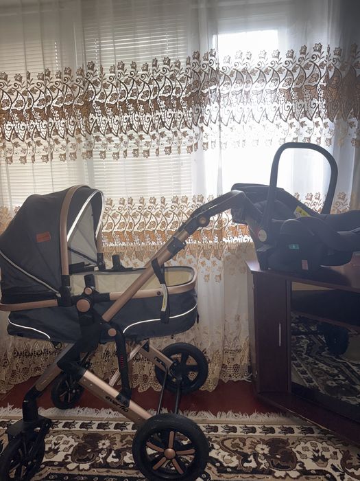 Детская коляска с автолюлькой