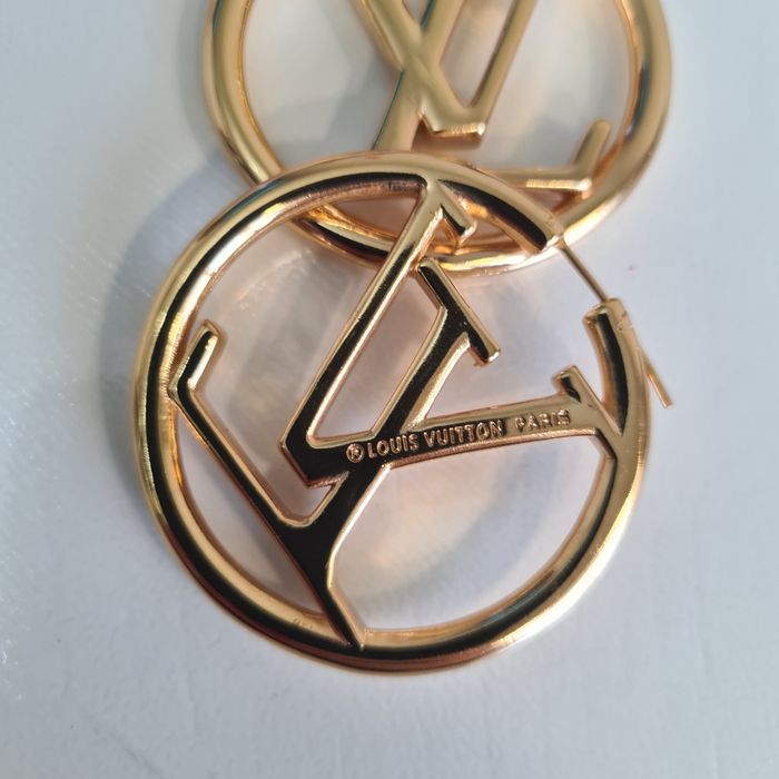 Серёжки от Dior и Louis Vuitton