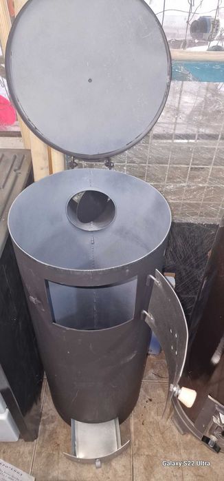 Отоплителна печка без кофа твърдо гориво