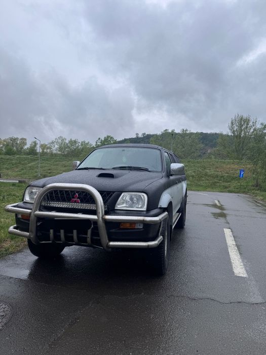 Mitsubishi L200 4x4 • 2.5 Diesel • 2006 • Echipată Off-Road • Întreținută • 7000€ Neg

Mitsubishi L200 2.5 diesel, an 2006, autoutilitară, al doilea p