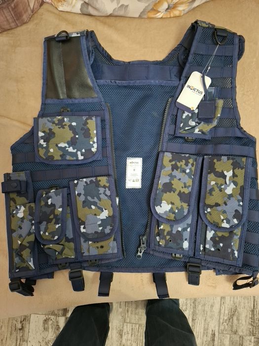 Vestă multifuncțională