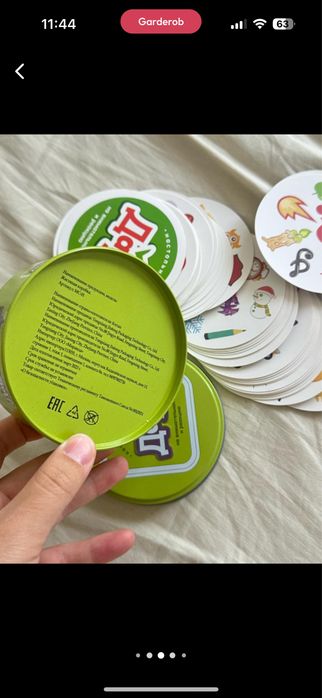 Книга на казахском и настольная игра