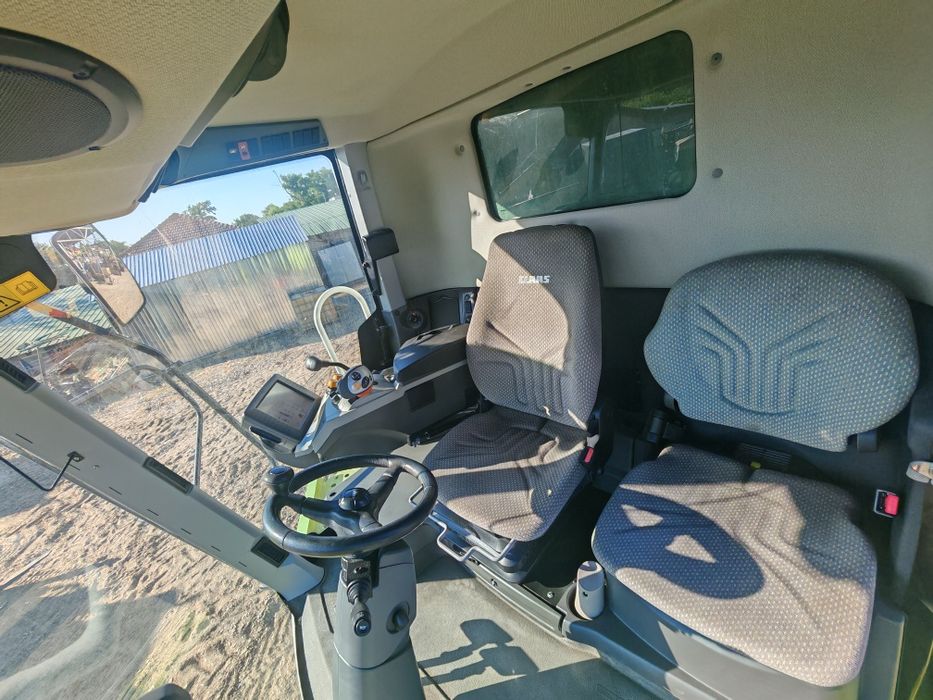 Combina Claas Tucano 320