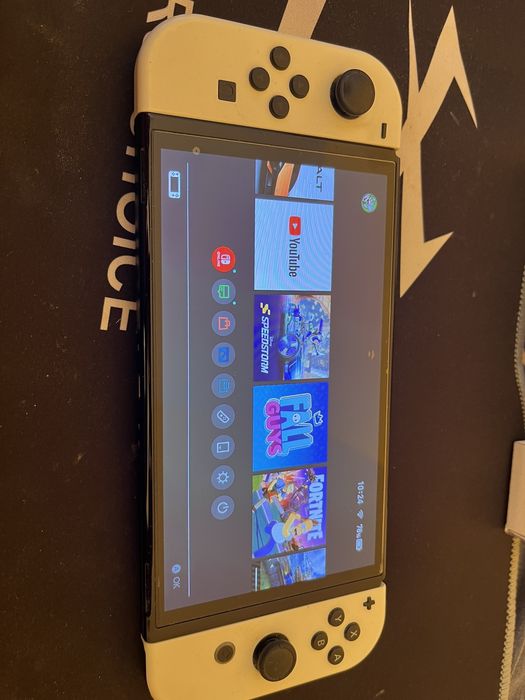 Nintenfo switch OLED + игра SpoungeBob и още инсталирани игри