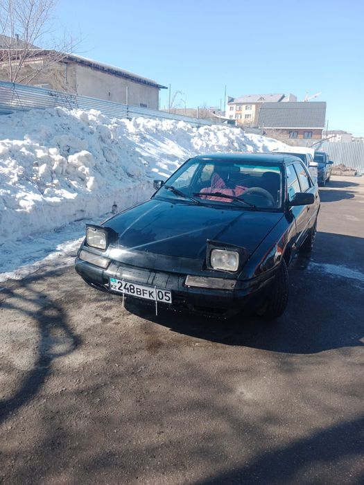 Продам машину Мазда 323