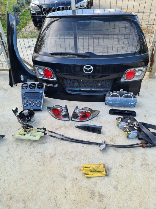 Radio cd,stopuri,ceasuri bord,climatronic Mazda 6 combi