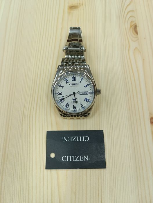 Citizen часы автоматика