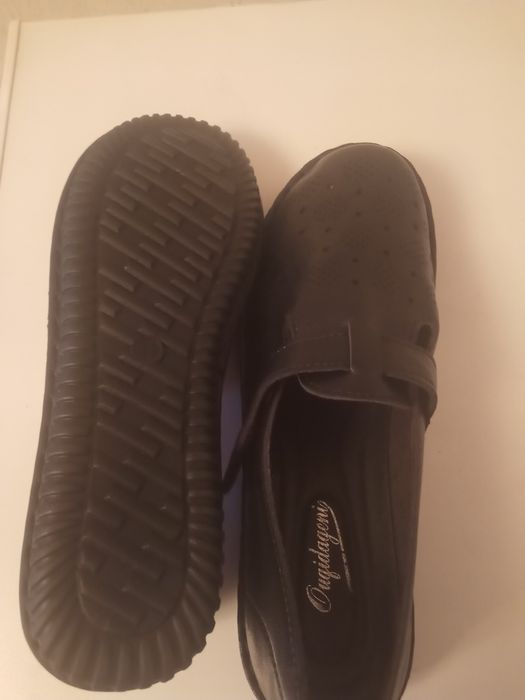 Новые кожаные туфли