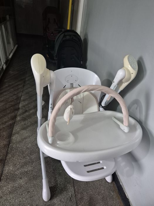 Scaun de masa cu functie de leagan electric