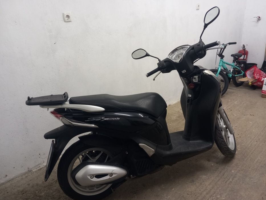 Honda sh 125 mode 2014г.