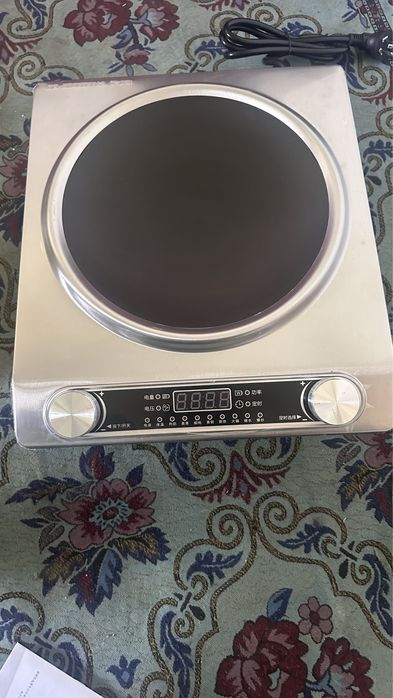 индукционная плита новый