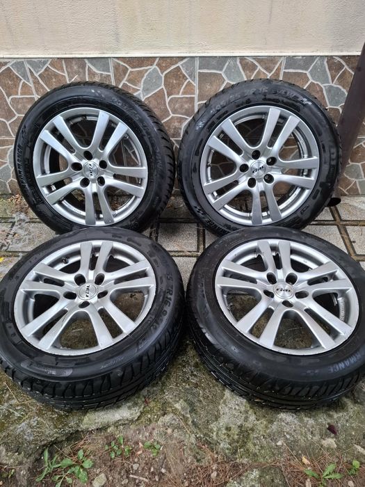Set 4 roți complete (jante aliaj + anvelope Taurus P4 Performance) 205/55 R16 94W.