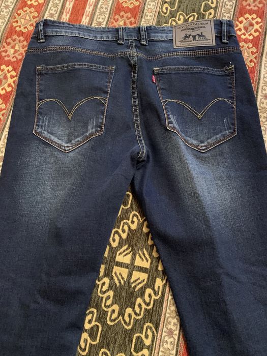Джинсы мужские