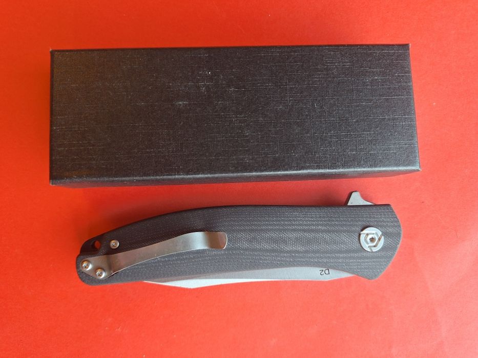 Сгъваем нож-стомана D2,дръжка G10