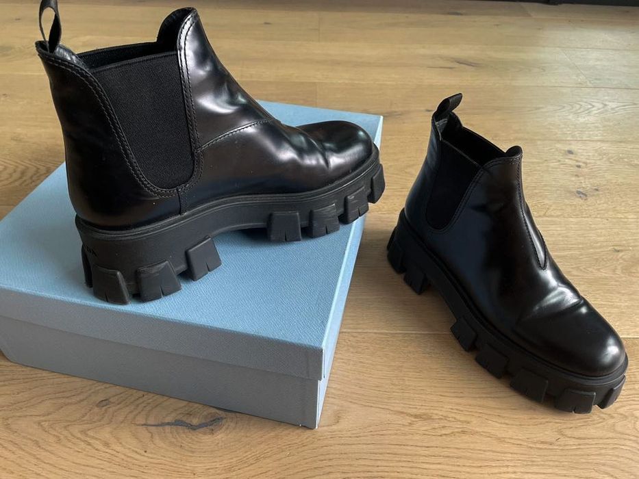 PRADA
Monolith leather ankle boots