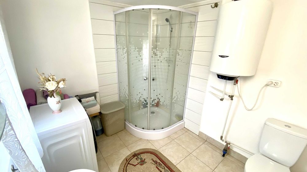 Casă cu teren mare si curte amenajata, de vânzare în Cordău – Locație excelenta, situată chiar în centrul localității!