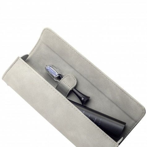 Электрическая зубная щетка