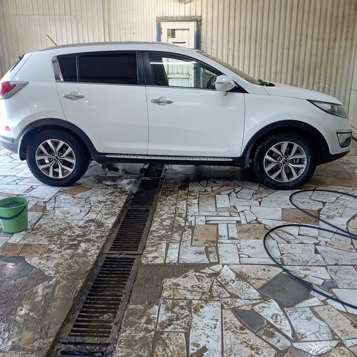 Автомобиль киа спортейж