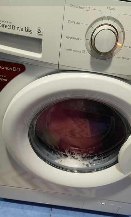 Продам машку автомат LG