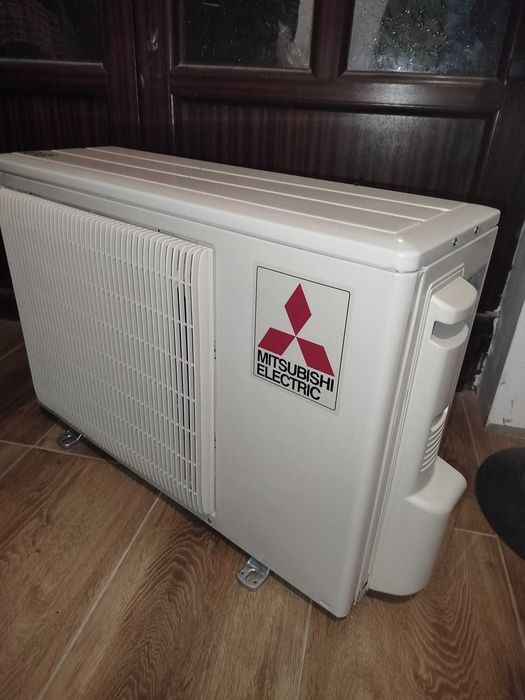 Aer conditionat Mitsubishi 12 000 Btu cu unitate externa noua in perfecta stare de functionare .