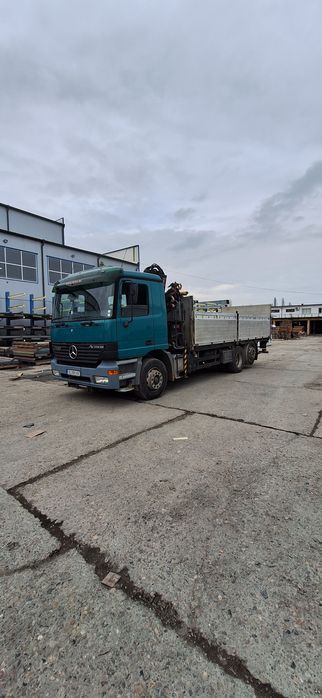 Транспортни услуги Камион с кран  и падащ борд щипа за инертни материали