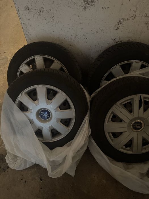 Vand anvelope brigestone cu jante de tabla