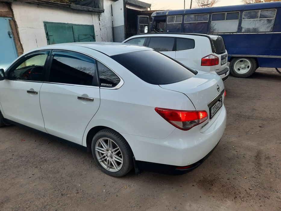 Автомобмль Ниссан Альмера