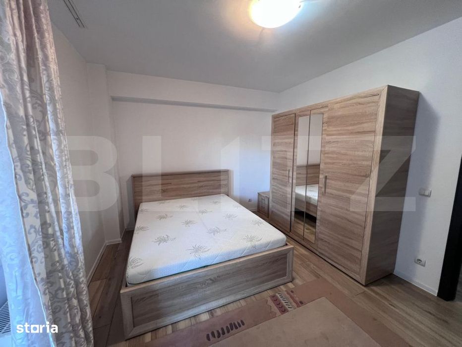 Apartament 2 camere, curte proprie, parcare subterana inclusa