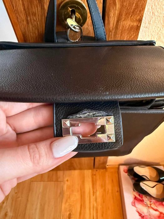 Кожена раница с три разделения и вътрешни джобове