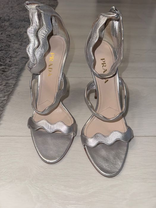 Prada scalloped silver metallic leather heels.