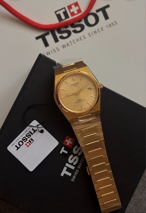 часы Tissot PRX мехвника в золотом цвете