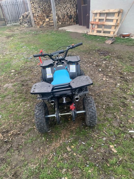 Vând atv copii aproape nou