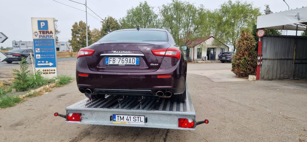 Tractari STL  auto utilaje transport masini platforma slep