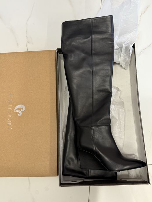 Продам новые сапоги