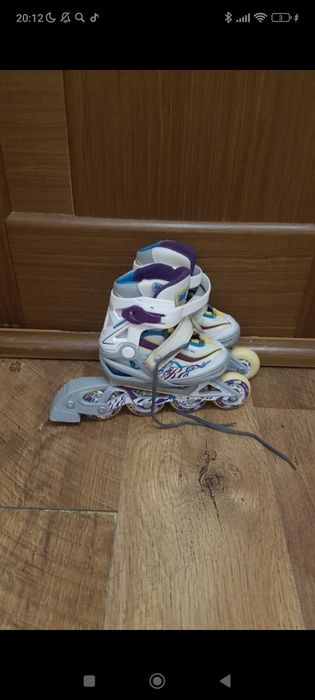 Роликовые коньки