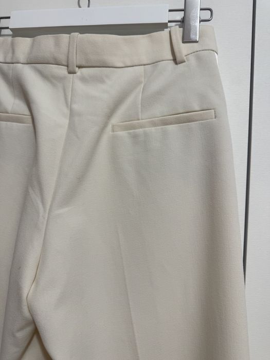 Pantaloni loose fit eleganți butter cream din stofă cu vipușca Zara XS