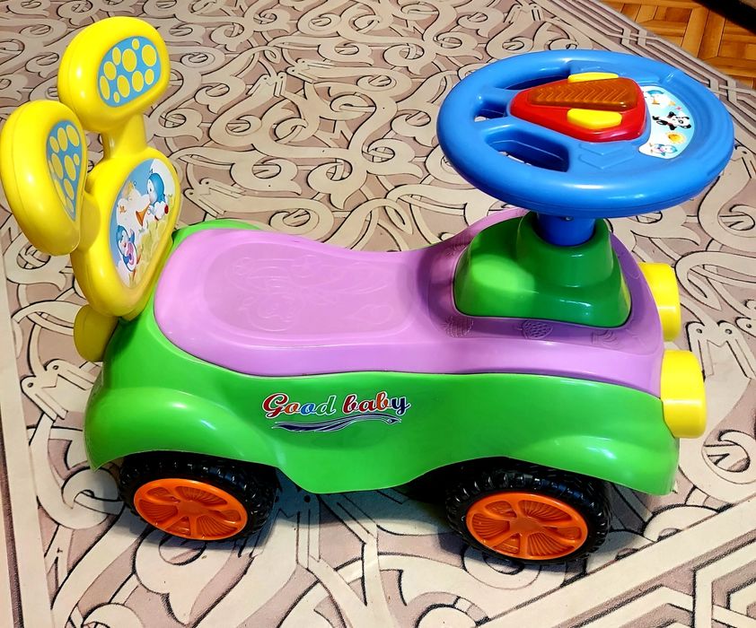 Машинка каталка детская
