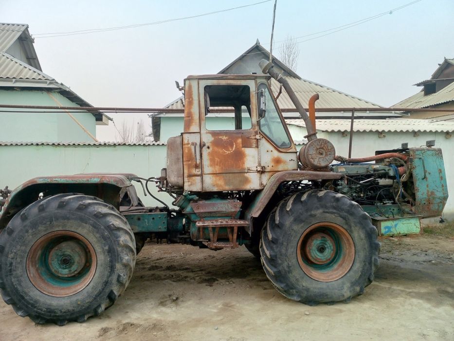 Трактор к 150 сотилади ,чакман мотор,каропка койилган ишлаши Зур