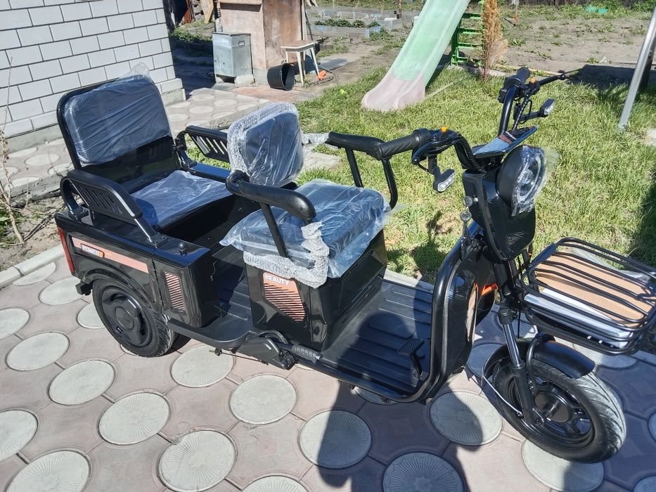 Электрический трицикл новый