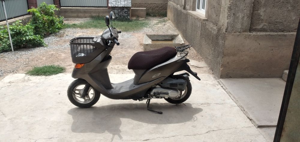 Скутер хонда честа