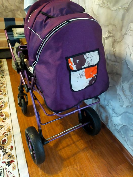 Детская прогулочная коляска