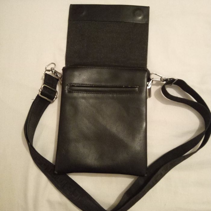 Продам барсетку бушный кожаный