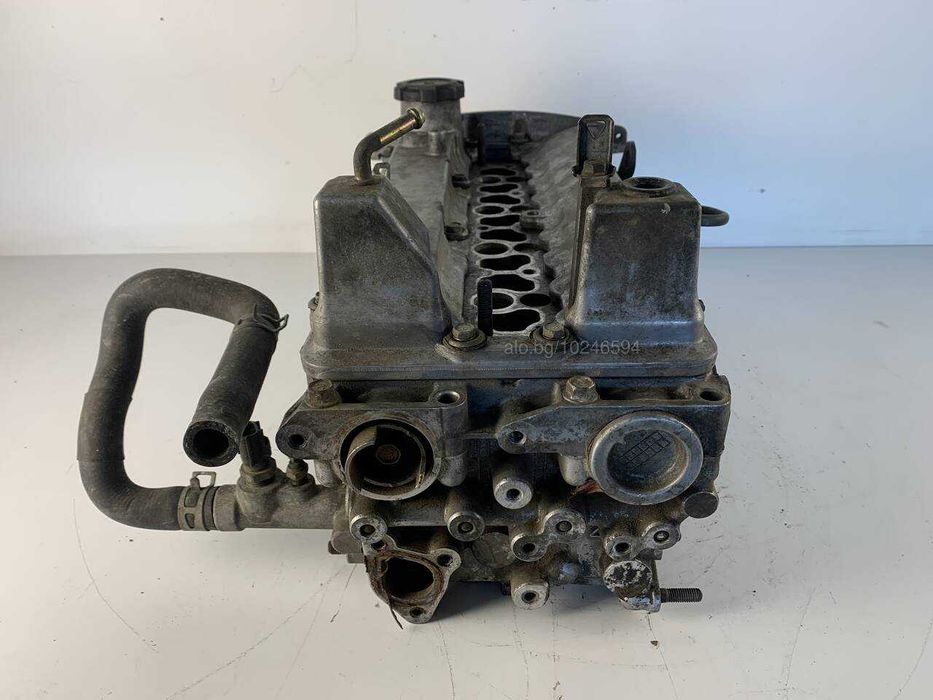 Цилиндрова глава Mitsubishi Митсубиши 1.8 GDI 120 к.с. (1999-2007)