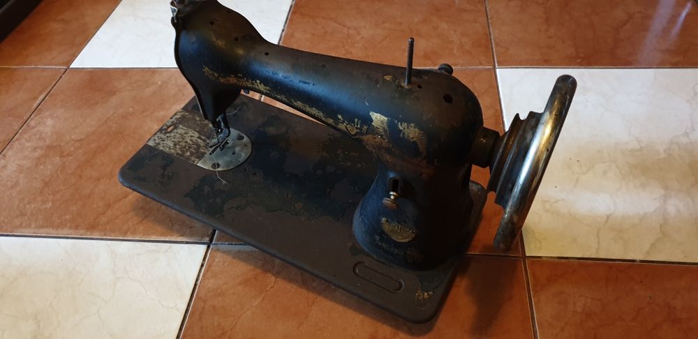 Mașină de cusut Singer