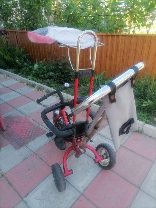 Продам детский велосипед с ручкой